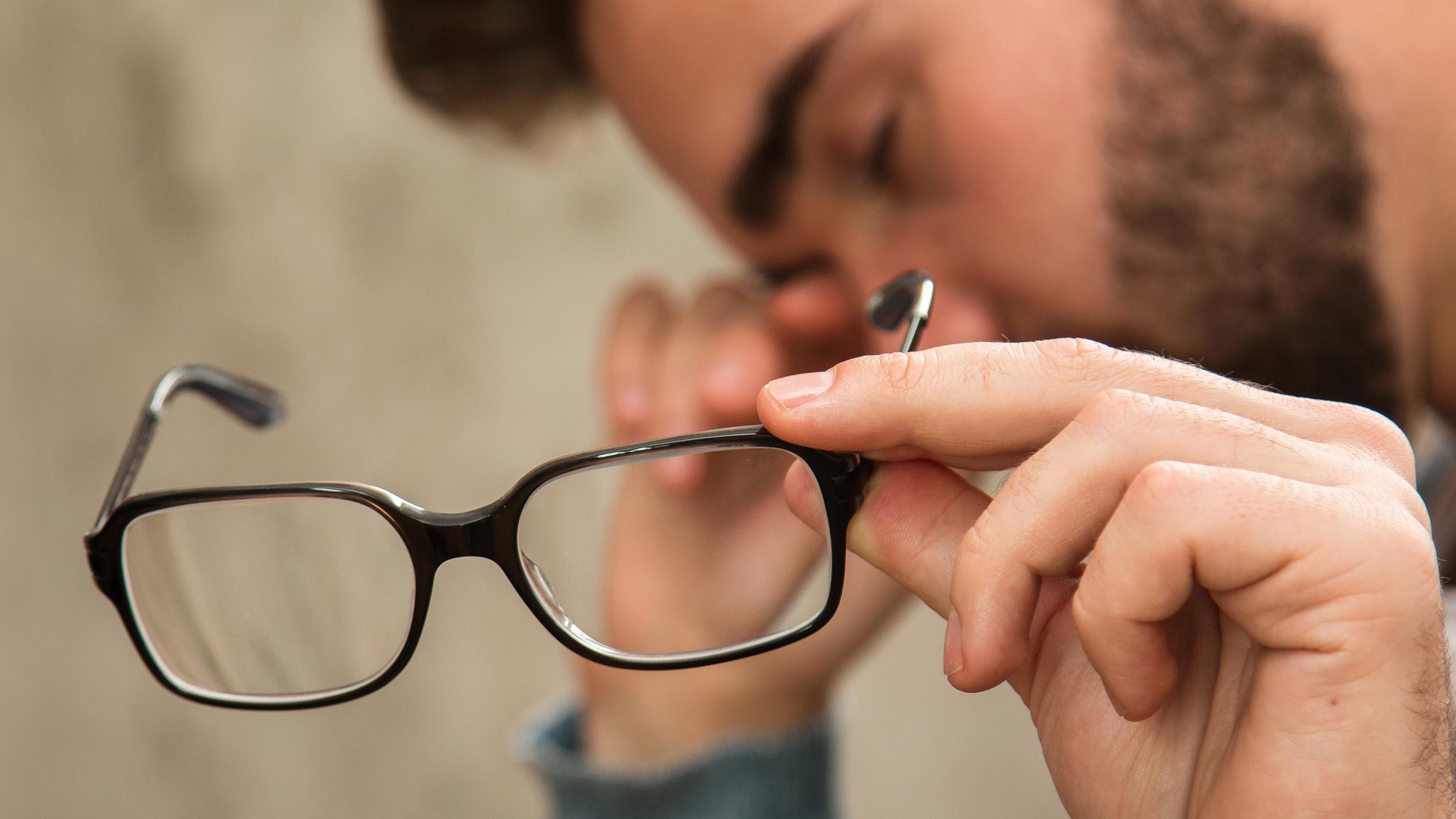 Man Tired with Glasses